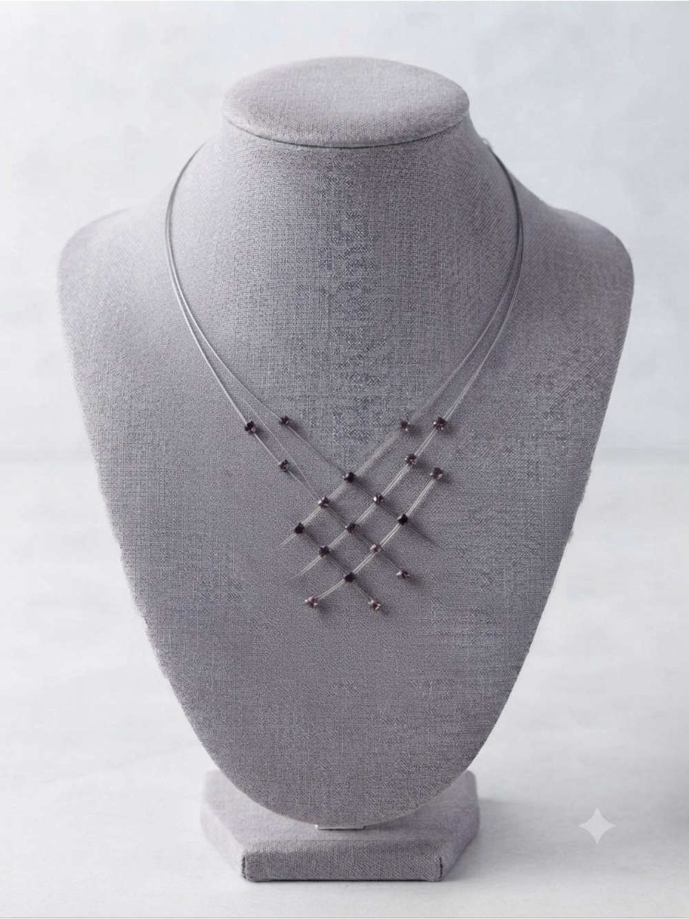 Multi-Strand Silver Wire Necklace with light and dark purple Crystals